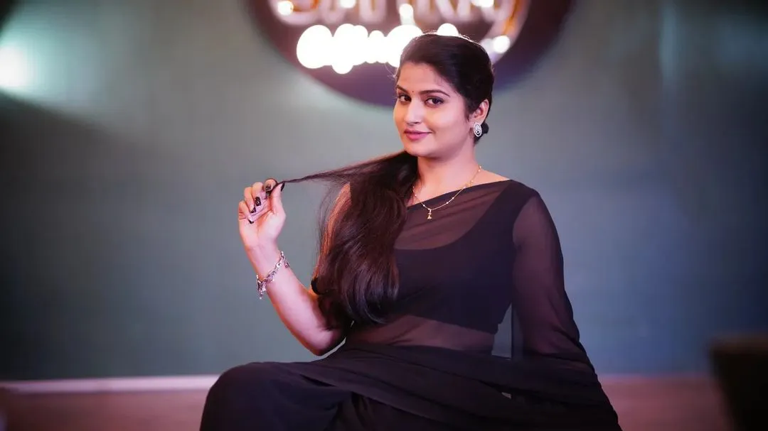 TELUGU TELEVISION ACTRESS RUPA MUGGALLA STILLS IN BLACK SAREE 3